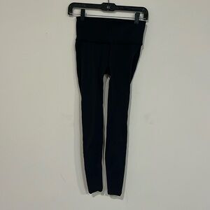 Lululemon black high rise tights w/perforation detail on leg sz 6 25” inseam